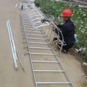 Fixed steel access ladder with safety cage for warehouse and factory