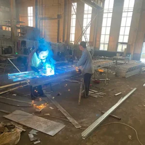 Steel caged ladder welding fabrication in factory